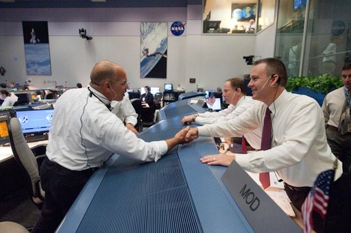 STS135 flight controllers on console during last shuttle mission