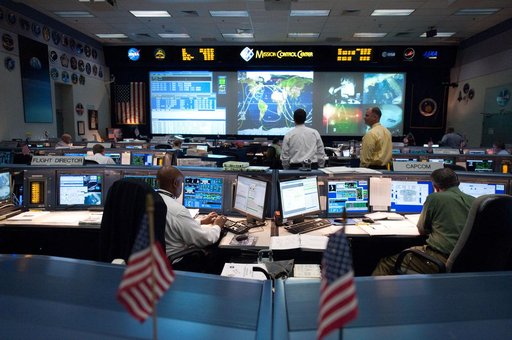 STS-135 Flight Controllers on Console. Shift: SSP Orbit 1/ISS Orbit 2 EVA