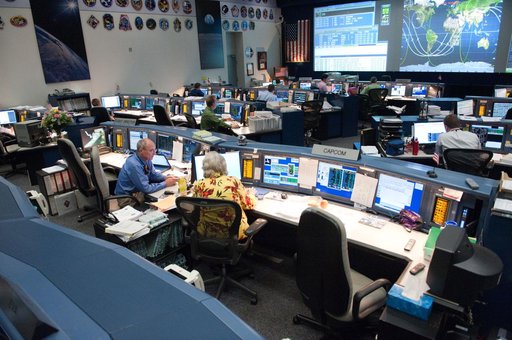 STS-135 Flight Controllers on Console. Orbit 3