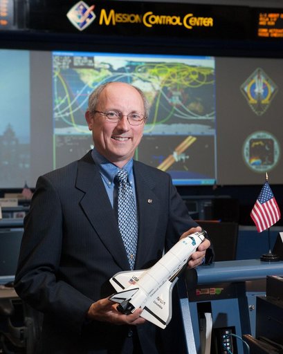 STS-135 Flight Controllers on Console