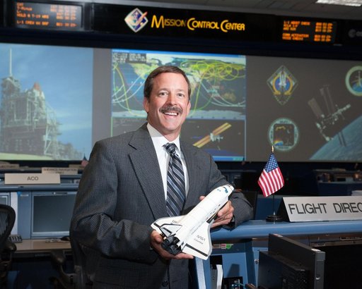 STS-135 Flight Controllers on Console