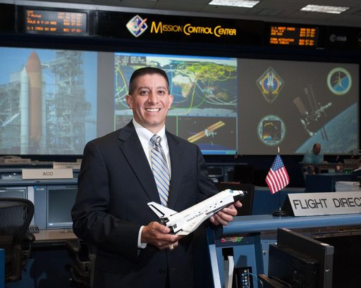 STS-135 Flight Controllers on Console