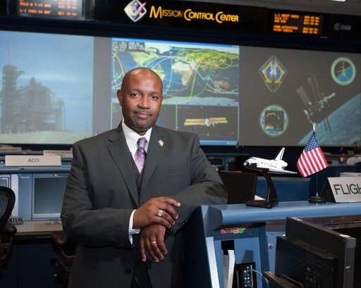 STS-135 Flight Controllers on Console