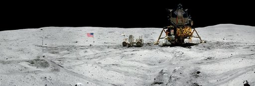 jsc2011e118363 - Panorama view of Apollo 16 commander Astronaut John W. Young, working at the Lunar Roving Vehicle (LRV) just prior to deployment of the Apollo Lunar Surface Experiments Package (ALSEP) during the first moonwalk of the mission on April 21,