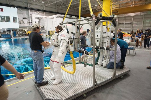 Expedition 32 crew members Suni Williams and Aki Hoshide conduct pre-test briefings