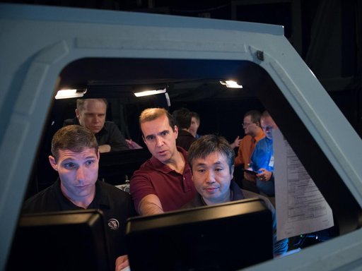 Expedition 39 (Soyuz 37) crew members in the building 16 dome