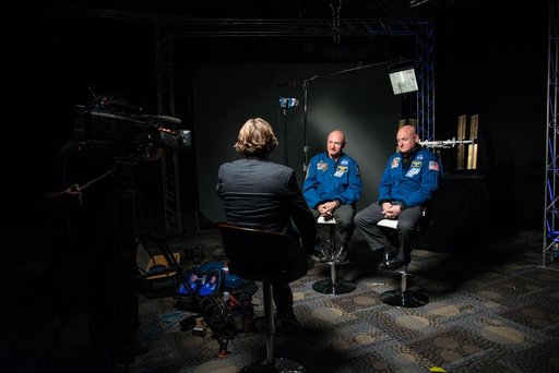 Mark and Scott Kelly talk to news media