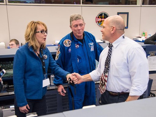 Date: 03-27-15.Location: Bldg 30 South, FCR-1.Subject: Former Arizona Congresswoman Gabby Giffords with Astronaut Mike Fossum and JSC Center Director Ellen Ochoa.Photographer: James Blair /  NASA