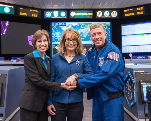 Date: 03-27-15.Location: Bldg 30 South, FCR-1.Subject: Former Arizona Congresswoman Gabby Giffords with Astronaut Mike Fossum and JSC Center Director Ellen Ochoa.Photographer: James Blair /  NASA