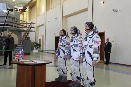 CG4G8713 --- (6 May 2015) --- At the Gagarin Cosmonaut Training Center in Star City, Russia, Expedition 44/45 backup Soyuz Commander Yuri Malenchenko of the Russian Federal Space Agency (Roscosmos, center) and his crewmates, Timothy Peake of the European Space Agency (left) and Timothy Kopra of NASA