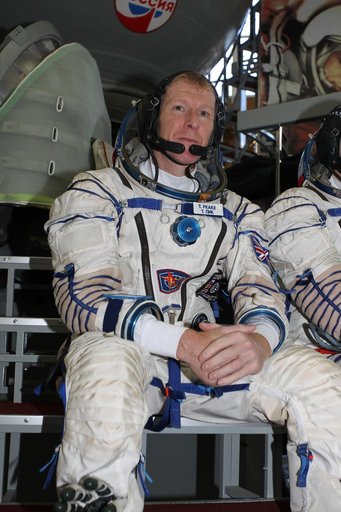 CG4G8784 --- (6 May 2015) --- At the Gagarin Cosmonaut Training Center in Star City, Russia, Expedition 44/45 backup Flight Engineer Timothy Peake of the European Space Agency answers questions from reporters in front of a Soyuz spacecraft simulator May 6 as part of his final qualification exams for