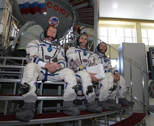 CG4G8796_1 --- (6 May 2015) --- At the Gagarin Cosmonaut Training Center in Star City, Russia, Expedition 44/45 backup crewmembers Timothy Peake of the European Space Agency (left), Yuri Malenchenko of the Russian Federal Space Agency (Roscosmos, center) and Timothy Kopra of NASA (right) answer ques