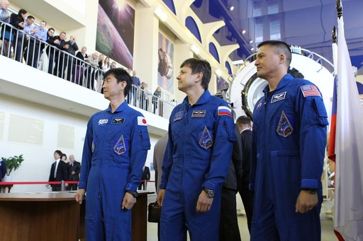 CG4G8954 --- (6 May 2015) --- At the Gagarin Cosmonaut Training Center in Star City, Russia, Expedition 44/45 crewmembers Kimya Yui of the Japan Aerospace Exploration Agency (left), Oleg Kononenko of the Russian Federal Space Agency (Roscosmos, center), and Kjell Lindgren of NASA (right) answer ques
