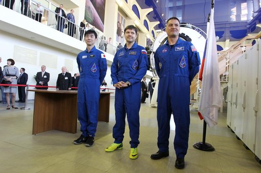 CG4G9036 --- (6 May 2015) --- At the Gagarin Cosmonaut Training Center in Star City, Russia, Expedition 44/45 crewmembers Kimya Yui of the Japan Aerospace Exploration Agency (left), Oleg Kononenko of the Russian Federal Space Agency (Roscosmos, center), and Kjell Lindgren of NASA (right) answer ques