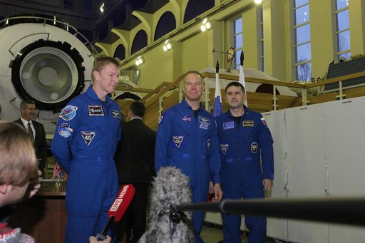 At the Gagarin Cosmonaut Training Center in Star City, Russia, Expedition 46-47 prime crewmembers Tim Peake of the European Space Agency (left), Tim Kopra of NASA (center) and Yuri Malenchenko of the Russian Federal Space Agency (Roscosmos, right) answer reporters��� questions Nov. 19 at the start o