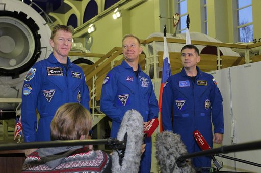 At the Gagarin Cosmonaut Training Center in Star City, Russia, Expedition 46-47 prime crewmembers Tim Peake of the European Space Agency (left), Tim Kopra of NASA (center) and Yuri Malenchenko of the Russian Federal Space Agency (Roscosmos, right) answer reporters��� questions Nov. 19 at the start o
