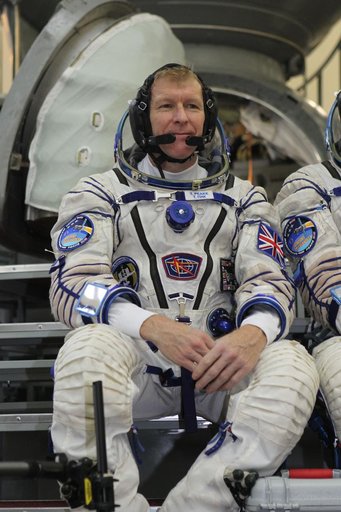 At the Gagarin Cosmonaut Training Center in Star City, Russia, Expedition 46-47 crewmember Tim Peake of the European Space Agency listens to a reporter���s question Nov. 20 during the start of final qualification exams. Peake, Yuri Malenchenko of the Russian Federal Space Agency (Roscosmos, center) 