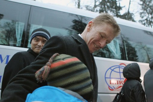 At the Gagarin Cosmonaut Training Center in Star City, Russia, Expedition 46-47 crewmember Tim Peake of the European Space Agency prepares to depart for his launch site at the Baikonur Cosmodrome in Kazakhstan Nov. 30 as backup crewmember Takuya Onishi of the Japan Aerospace Exploration Agency (JAXA