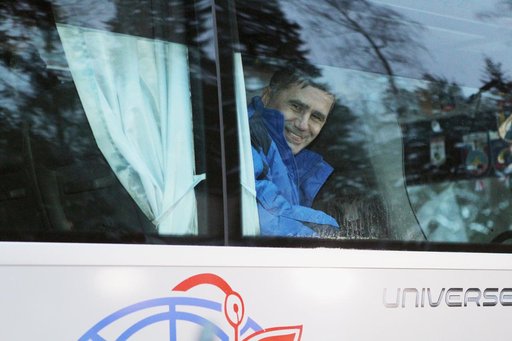 At the Gagarin Cosmonaut Training Center in Star City, Russia, Expedition 46-47 crewmember Yuri Malenchenko of the Russian Federal Space Agency (Roscosmos) flashes a smile Nov. 30 as he departs for the airport and the flight to his launch site at the Baikonur Cosmodrome in Kazakhstan. Malenchenko, T