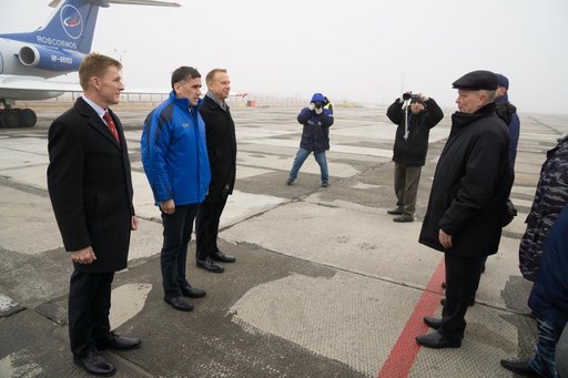 The Expedition 46-47 crewmembers arrive in Baikonur, Kazakhstan Nov. 30 for final pre-launch training following a flight from their training base at the Gagarin Cosmonaut Training Center in Star City, Russia. Tim Peake of the European Space Agency (left), Yuri Malenchenko of the Russian Federal Spac
