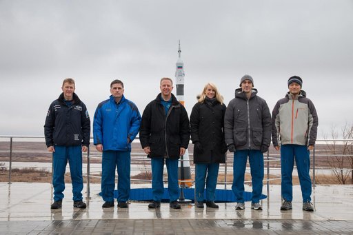 Behind their Cosmonaut Hotel crew quarters in Baikonur, Kazakhstan, the prime and backup Expedition 46-47 crewmembers pose for pictures Dec. 9 during a break in their training. From left to right are prime crewmembers Tim Peake of the European Space Agency, Yuri Malenchenko of the Russian Federal Sp