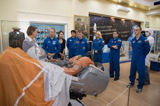 During a break from training, the Expedition 46-47 prime and backup crewmembers toured the Korolev Museum at the Baikonur Cosmodrome in Kazakhstan Dec. 10 and listened to museum curators discuss past Russian space memorabilia. From left to right are prime crewmember Tim Kopra of NASA, backup crewmem