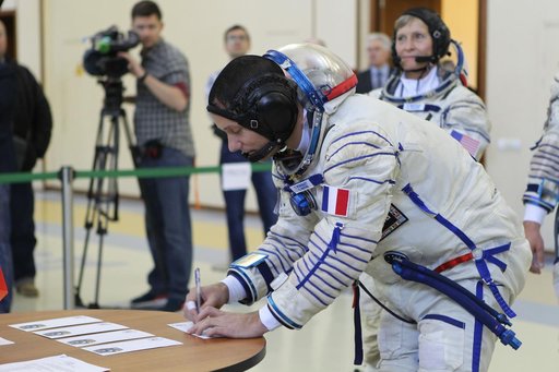 At the Gagarin Cosmonaut Training Center in Star City, Russia, Expedition 48-49 backup crewmember Thomas Pesquet of the European Space Agency signs in for Soyuz qualification exams May 26. Pesquet, Peggy Whitson of NASA and Oleg Novitskiy of Roscosmos are serving as the backups to prime crewmembers 