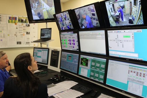 At the Gagarin Cosmonaut Training Center in Star City, Russia, training instructors monitor the work of Expedition 48-49 prime crewmembers Kate Rubins of NASA, Takuya Onishi of the Japan Aerospace Exploration Agency and Anatoly Ivanishin of Roscosmos during final qualification exams May 26. Rubins, 