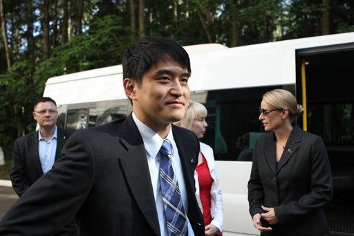 ISS Expedition 48-49 crewmember Takuya Onishi of the Japan Aerospace Exploration Agency departs the Gagarin Cosmonaut Training Center in Star City, Russia June 24 for his launch site at the Baikonur Cosmodrome in Kazakhstan and final pre-launch training. In the background on the right is crewmate Ka