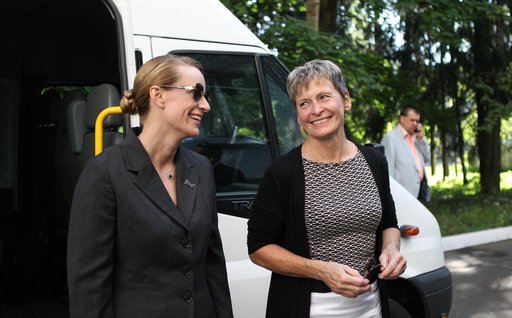 At the Gagarin Cosmonaut Training Center in Star City, Russia, ISS Expedition 48-49 prime crewmember Kate Rubins of NASA (left) shares a lighthearted moment June 24 with backup crewmember Peggy Whitson of NASA before departing for their launch site at the Baikonur Cosmodrome in Kazakhstan. Rubins, A