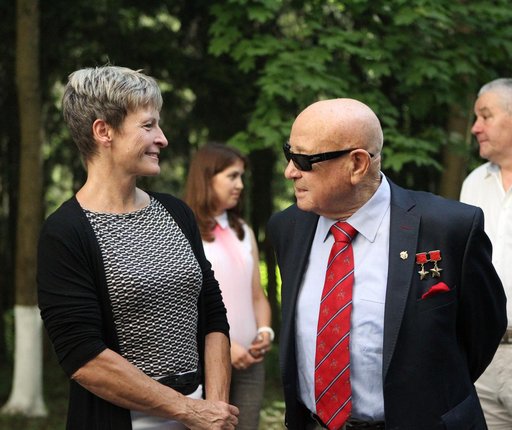 At the Gagarin Cosmonaut Training Center in Star City, Russia, ISS Expedition 48-49 backup crewmember Peggy Whitson of NASA (left) shares a lighthearted moment June 24 with legendary cosmonaut Alexey Leonov, the first human to walk in space, as Whitson and other crewmembers departed for their launch