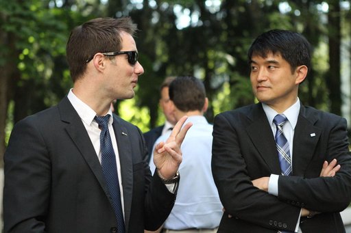 At the Gagarin Cosmonaut Training Center in Star City, Russia, ISS Expedition 48-49 backup crewmember Thomas Pesquet of the European Space Agency (left) shares a moment with prime crewmember Takuya Onishi of the Japan Aerospace Exploration Agency June 24 before heading to their launch site at the Ba
