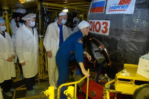 In the Integration Facility at the Baikonur Cosmodrome in Kazakhstan, Expedition 48-49 crewmember Kate Rubins of NASA climbs aboard the Soyuz MS-01 spacecraft June 25 for a �ޔfit check��� dress rehearsal activity. Rubins, Anatoly Ivanishin of Roscosmos and Takuya Onishi of the Japan Aerospace Explor