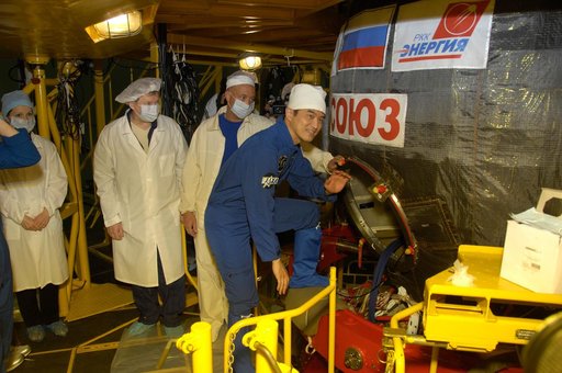 In the Integration Facility at the Baikonur Cosmodrome in Kazakhstan, Expedition 48-49 crewmember Takuya Onishi of the Japan Aerospace Exploration Agency climbs aboard the Soyuz MS-01 spacecraft June 25 for a �ޔfit check��� dress rehearsal activity. Onishi, Kate Rubins of NASA and Anatoly Ivanishin 