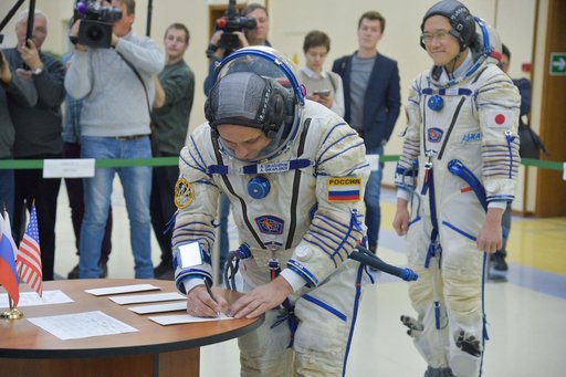 jsc2017e135200 - At the Gagarin Cosmonaut Training Center in Star City, Russia, Expedition 54-55 prime crewmember Anton Shkaplerov of the Russian Federal Space Agency (Roscosmos) signs in for the start of the crew’s final qualification exam activities N