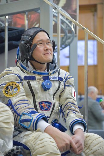 jsc2017e135207 - At the Gagarin Cosmonaut Training Center in Star City, Russia, Expedition 54-55 prime crewmember Norishige Kanai of the Japan Aerospace Exploration Space Agency (JAXA) listens to a reporters’ question Nov. 29 as part of the crew’s fin