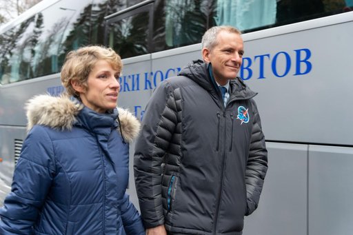 jsc2018e097269 - At the Gagarin Cosmonaut Training Center in Star City, Russia, Expedition 58 crewmember David Saint-Jacques of the Canadian Space Agency (right) walks with his wife, Veronique, to a waiting bus Nov. 19 that will take him and his crewmates