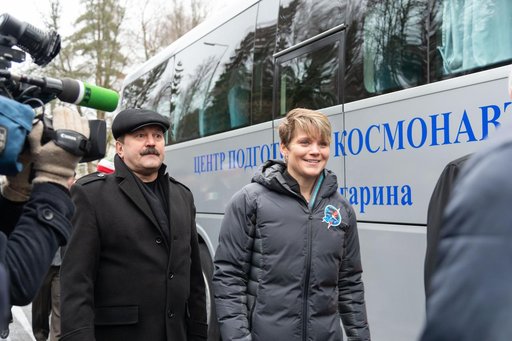 jsc2018e097271 - At the Gagarin Cosmonaut Training Center in Star City, Russia, Expedition 58 crewmember Anne McClain of NASA (right) walks to a waiting bus Nov. 19 that will take her and her crewmates to a nearby airfield for a flight to their launch sit