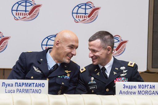 jsc2019e004421 - At the Gagarin Cosmonaut Training Center in Star City, Russia, Expedition 59 backup crewmembers Luca Parmitano of the European Space Agency (left) and Drew Morgan of NASA (right) exchange thoughts Feb. 21 during a pre-launch news conferen
