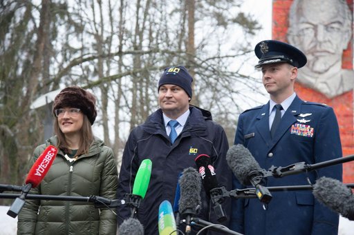 At the Gagarin Cosmonaut Training Center in Star City, Russia, Expedition 59 crewmembers Christina Koch of NASA (left), Alexey Ovchinin of Roscosmos (center) and Nick Hague of NASA (right) listen to reporters’ questions Feb. 26 as they prepared to depar