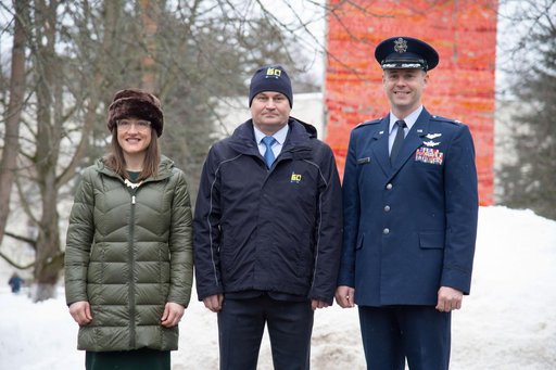 At the Gagarin Cosmonaut Training Center in Star City, Russia, Expedition 59 crewmembers Christina Koch of NASA (left), Alexey Ovchinin of Roscosmos (center) and Nick Hague of NASA (right) pose for pictures Feb. 26 as they prepared to depart for their lau