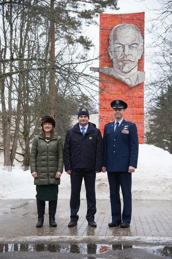 At the Gagarin Cosmonaut Training Center in Star City, Russia, Expedition 59 crewmembers Christina Koch of NASA (left), Alexey Ovchinin of Roscosmos (center) and Nick Hague of NASA (right) pose for pictures Feb. 26 in front of the statue of Vladimir Lenin