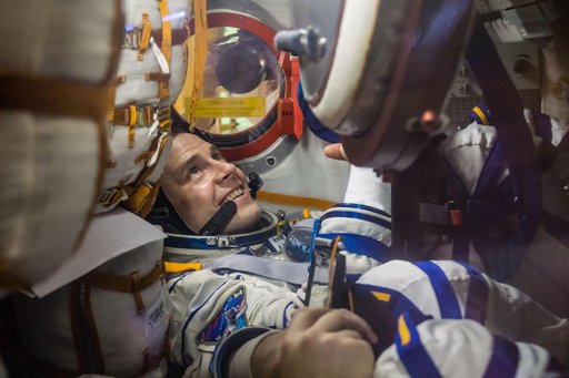 jsc2019e009957 - At the Baikonur Cosmodrome in Kazakhstan, Expedition 59 crewmember Nick Hague of NASA works inside the Soyuz MS-12 spacecraft Feb. 27 during pre-launch training. Hague, Christina Koch of NASA and Alexey Ovchinin of Roscosmos will launch M
