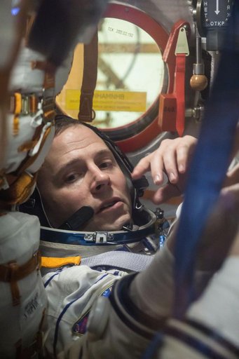 jsc2019e009958 - At the Baikonur Cosmodrome in Kazakhstan, Expedition 59 crewmember Nick Hague of NASA works inside the Soyuz MS-12 spacecraft Feb. 27 during pre-launch training. Hague, Christina Koch of NASA and Alexey Ovchinin of Roscosmos will launch M