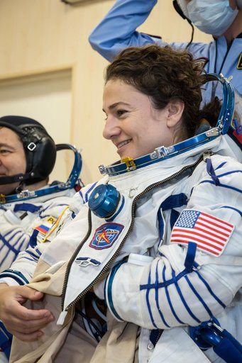 jsc2019e052885 - In the Integration Building at the Baikonur Cosmodrome in Kazakhstan, Expedition 61 crewmember Jessica Meir of NASA suits up Sept. 11 for a fit check aboard the Soyuz MS-15 spacecraft. Meir, Hazzaa Ali Almansoori of the United Arab Emirat