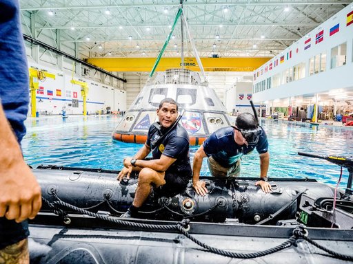 US Navy Divers practice recovery operations at JSC