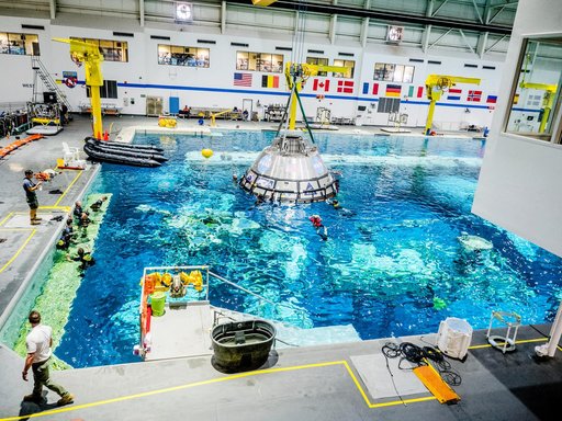 US Navy Divers practice recovery operations at JSC