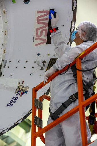 NASA and ESA logo installation on Artemis I spacecraft