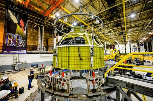 Orion crew module pressure vessel lifted from welding tool