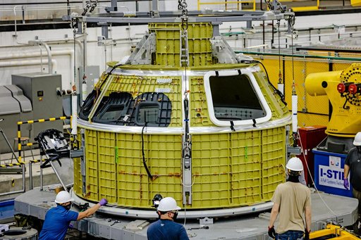 Orion crew module pressure vessel lifted from welding tool